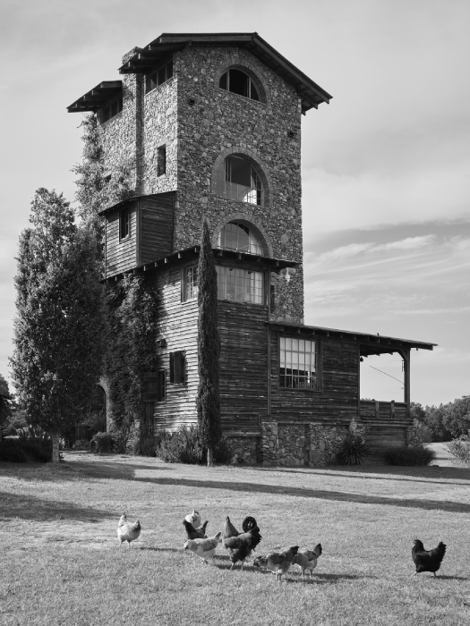 Black and white exterior shot of stone  house shot by Rob Culpepper for Barrett Austin's book Of Common Origin