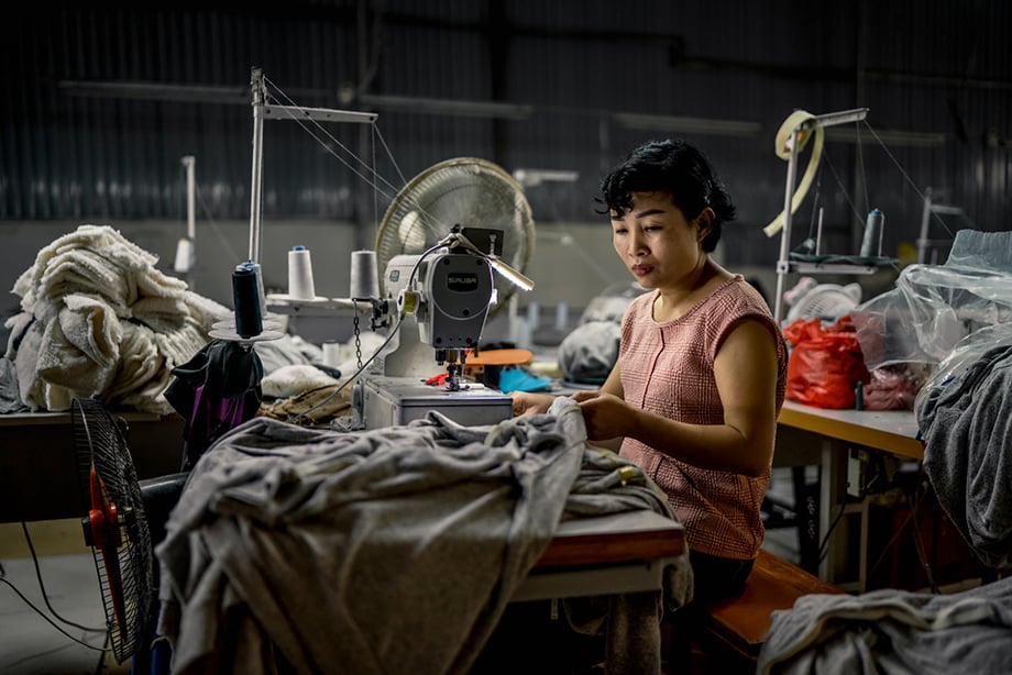 A Zilingo factory worker in Hanoi, Vietnam. Photography by Tim Gerard Barker. 