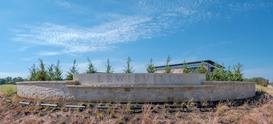 Exterior Signage of Lewisville Thrive Recreation Center photographed by Wade Griffith for Barker Rinker Seacat Architecture.