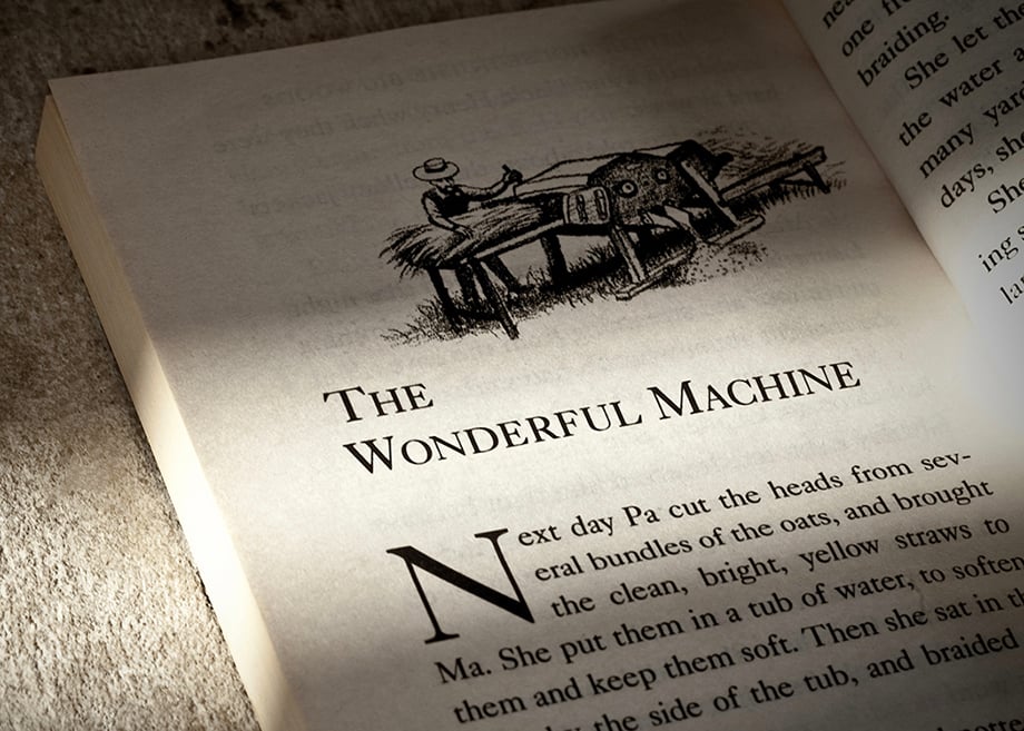 Opening page of the chapter The Wonderful Machine in the book Little House in the Big Woods by Laura Engels Wilder.