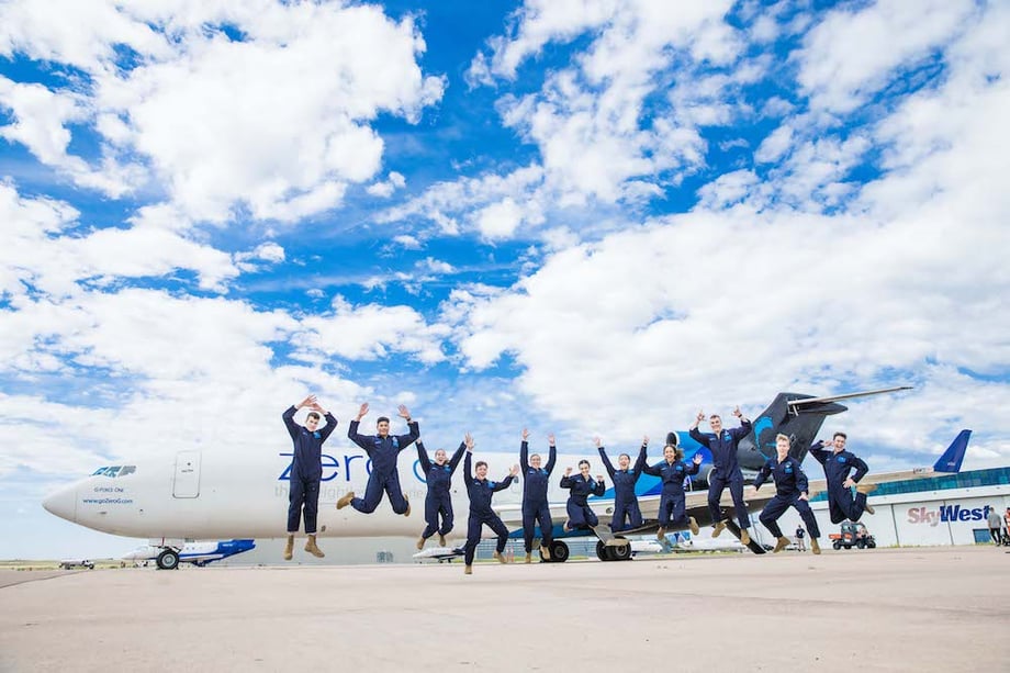 Image by Steve Boxall of the team of Zero Gravity jumping in unison in front of the Zero Gravity aircraft.