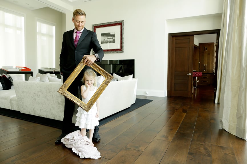 Behind the scenes shot of Ian Poulter and child by Ben Van Hook