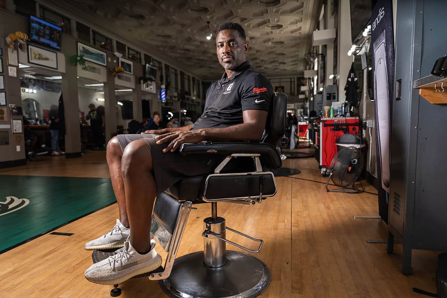 Barbershop owner Gaulien "Gee" Smith shot by Sara Stathas for the LA Times