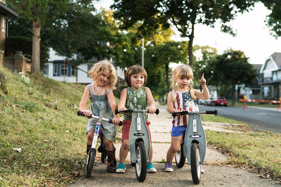 Photo of children on bikes shot by Kat Schleicher