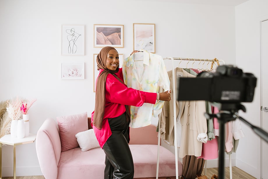 Asyha Harun doing a clothing haul for YouTube shot by Tiffany Luong.