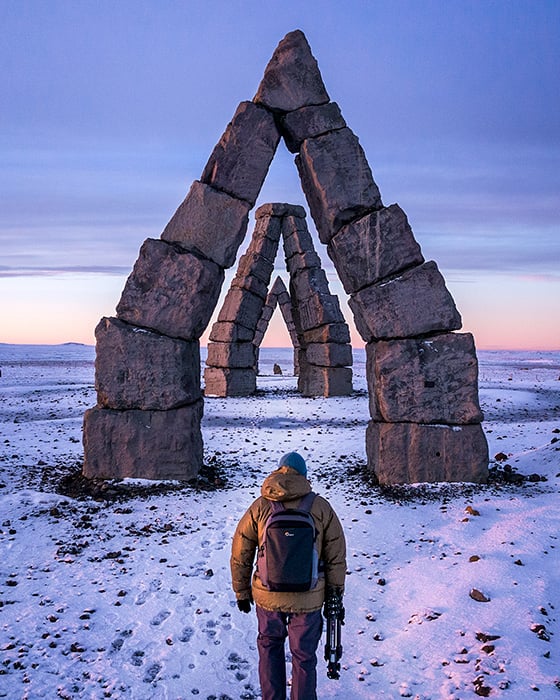 Photographer Rachid Dahnoun stands at the Arctic Henge sundial in northern Iceland for a video promoting Lowepro's Flipside Photo Backpack.