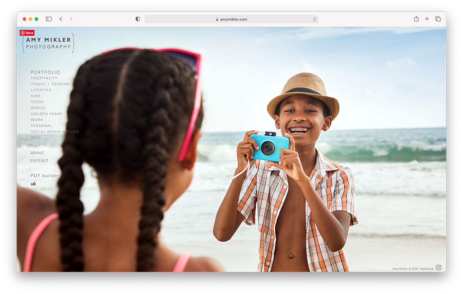 Screenshot of Austin-based photographer Amy Mikler's website featuring two children taking images of each other on the beach.