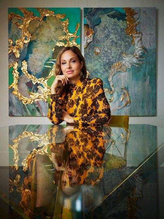 Portrait of a woman seated infront of abstract art, photographed by Fort Mill, SC-based portrait photographer Chris Edwards.