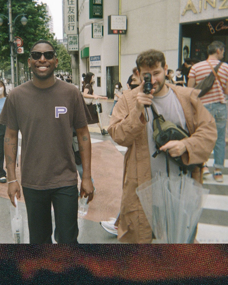Photo with Samm Henshaw and photographer crossing street in Seoul. 