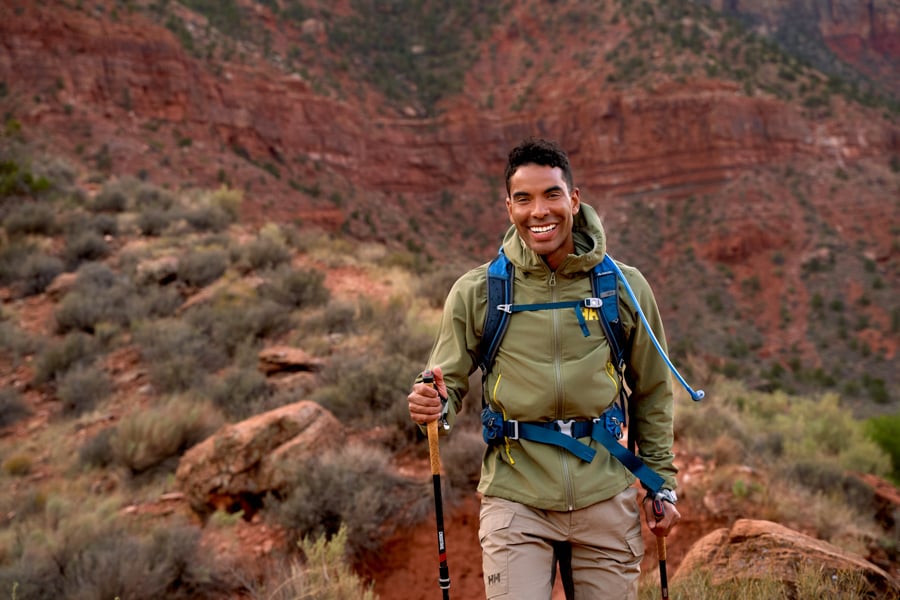 Photo of a hiker in a desert mountain range by NYC-based photographer Aaron Kyle Barton.