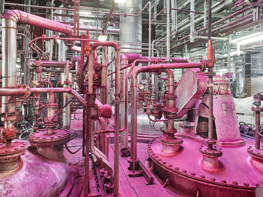 Pink machines inside of a factory by photographer duo Scanderbeg Sauer of Zürich, Switzerland