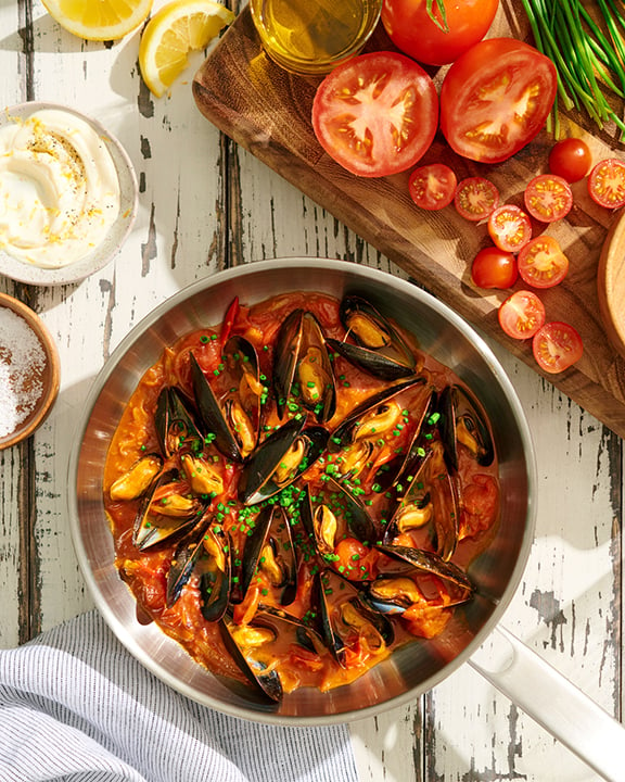 Mussels and tomato by Toronto photographer Anukriti Goswami