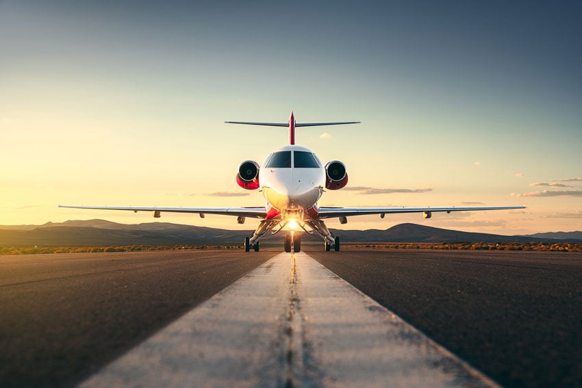 Braxton Wilhelmsen captures the sunset perfectly aligned under the Syberjet as it taxiis to take-off