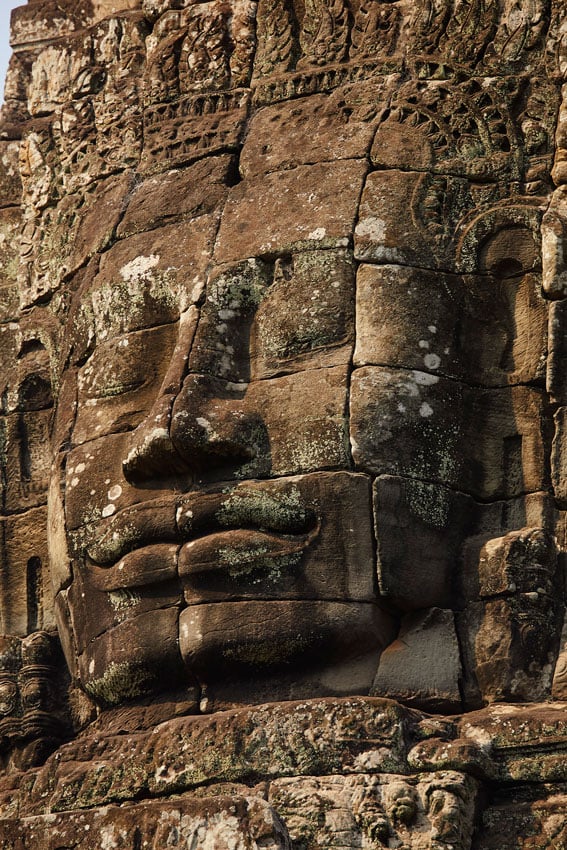 A face carved in stone is featured in this photo by Bruce Martin for Walking in the Shadow of Time 