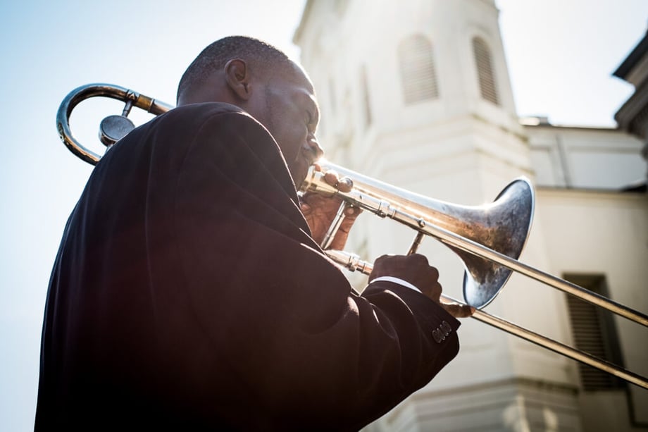 A man playing trombone. Creative in Place Carry a Tune photographer Chuk Nowak, Detroit, Michigan 