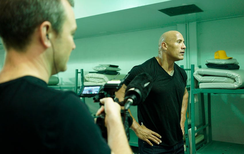 Craig Litten shares a behind the scenes shot of a crew member and Dwayne The Rock Jonnson 