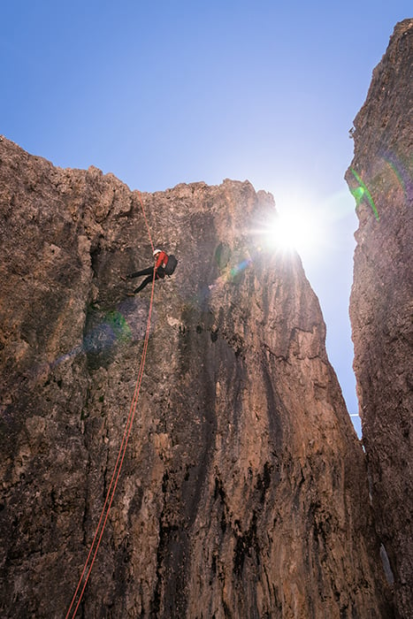 Pauli Trenkwalder rock climbing The Dolomites shot by Chandler Borries