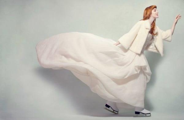 Woman ice skating in a gown, shot by photographer Dean Alexander