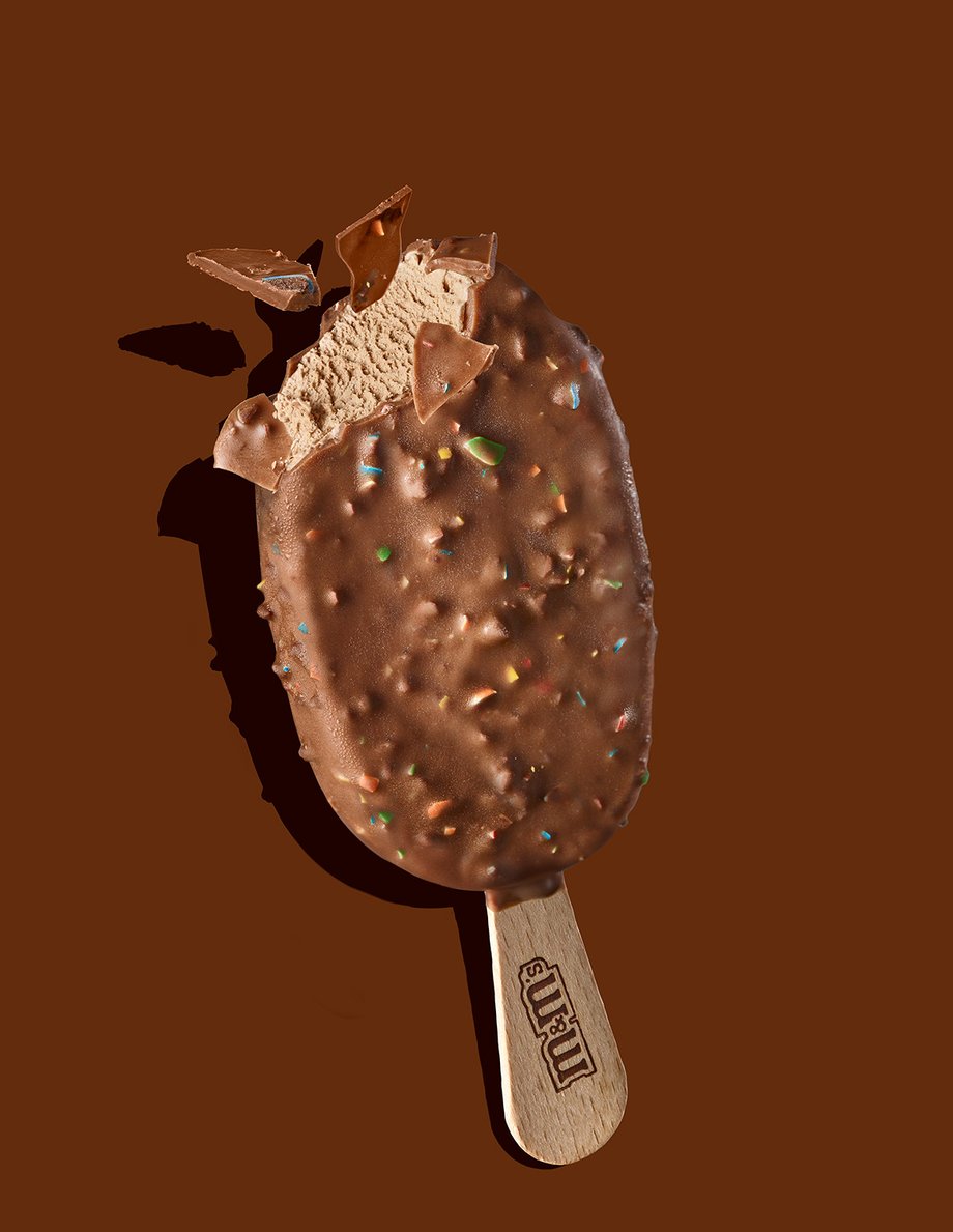 Francesco Majo's previous work for M&M shows an ice cream bar covered in chocolate with bits of embedded candy