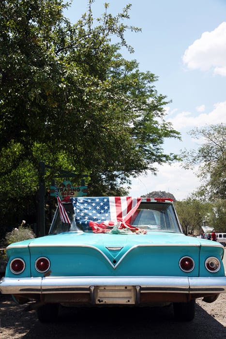 Rebecca Stumpf (Boulder, Colorado) photographed an old car draped with the flag