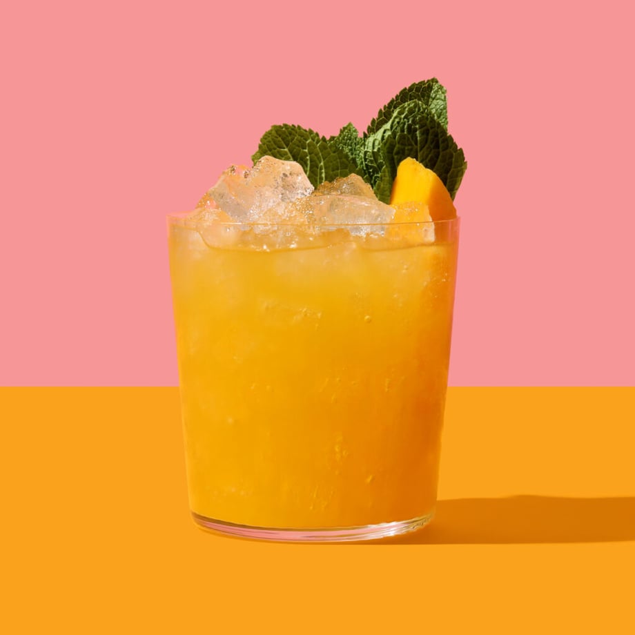 An orange cocktail garnished with mint by Jessica Ebelhar of Louisville, Kentucky