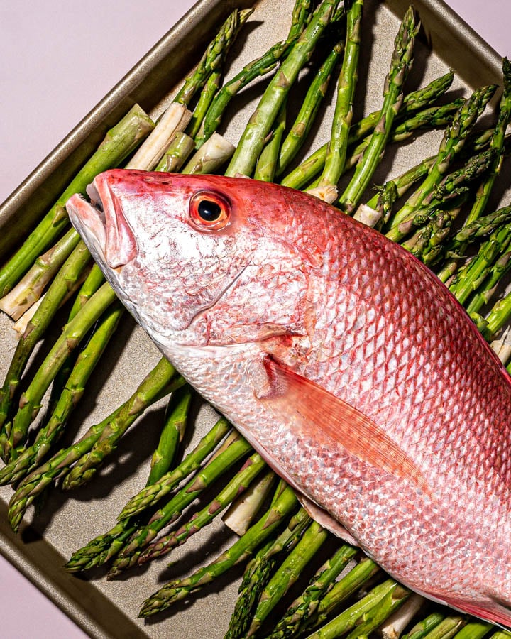 A pink fish on top of asparagus by phootgrapher Larisa Niedle of Edison, New Jersey. 