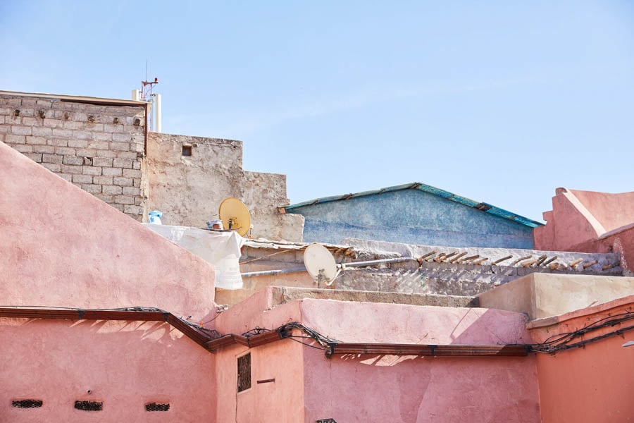 Pink rooftops against a blue sky by photographer Lucianna McIntosh of San Diego, California