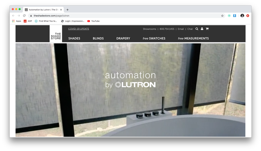 Screenshot of Mali Azima's photo for  The Shade Store showing a white jet tub by large windows with Lutron automated shades