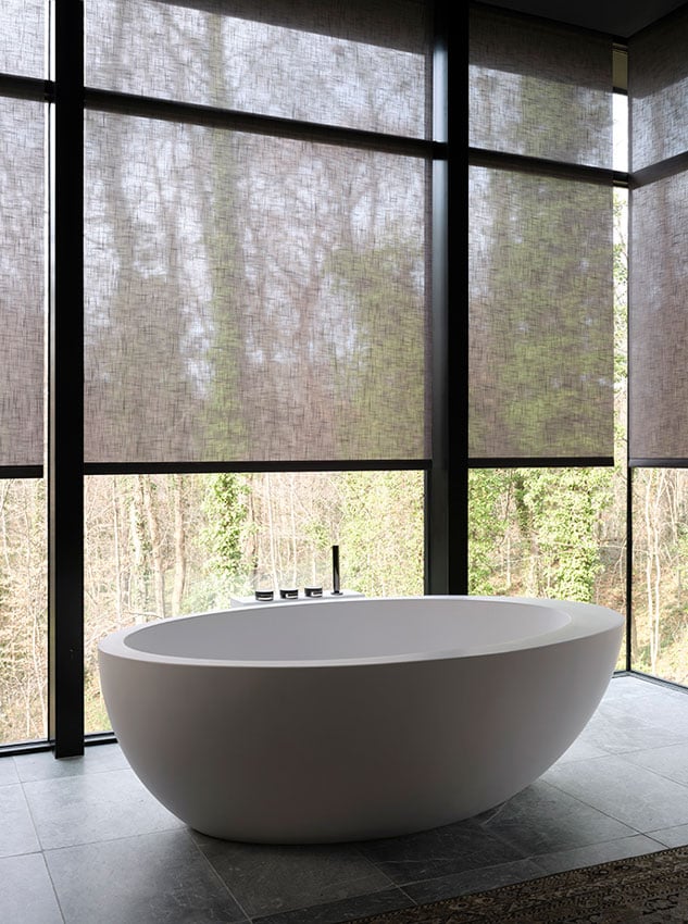 Another angle of the porcelain tub and shades shot by Mali Azima for The Shade Store