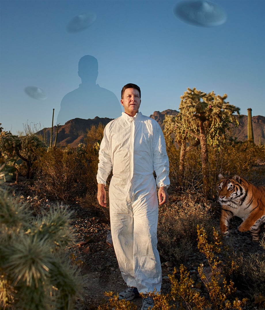 Photo with effects of a man in a white jumpsuit looking ahead as UFOs fly behind him and a tiger prepares to leap from behind him