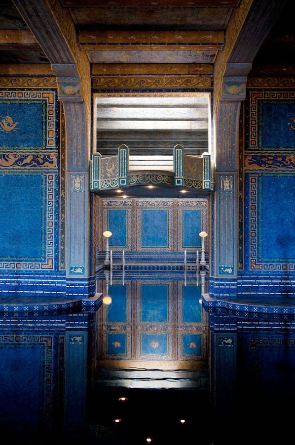 A photo of Roman Pool at Hearst Castle, a tiled indoor pool decorated with eight statues of Roman gods, goddesses and heroes in San Simeon, California by photographer Morgan Ione of Highland Park, Illinois.