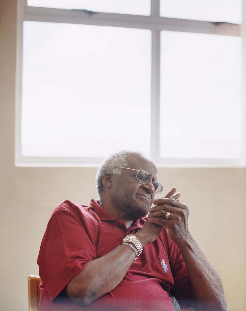 Photo of Bishop Desmond Tutu sitting in contemplation