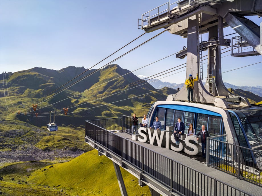 Arosa Tourismus, swiss cable car with mountains