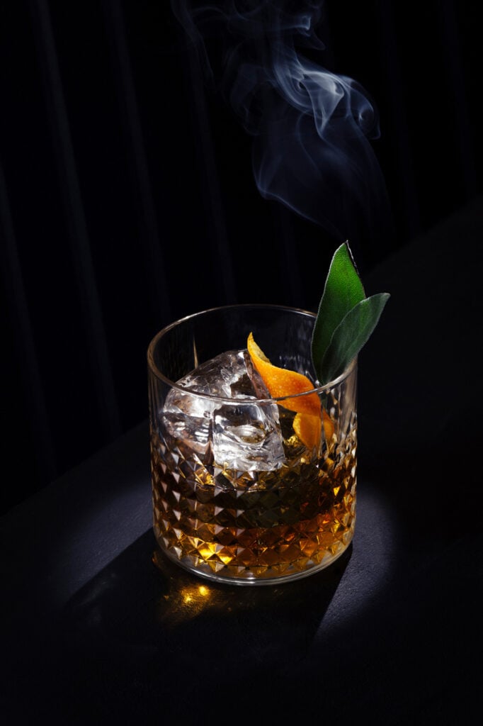 A smoking whiskey cocktail by Sedona Turbeville of Los Angeles, California