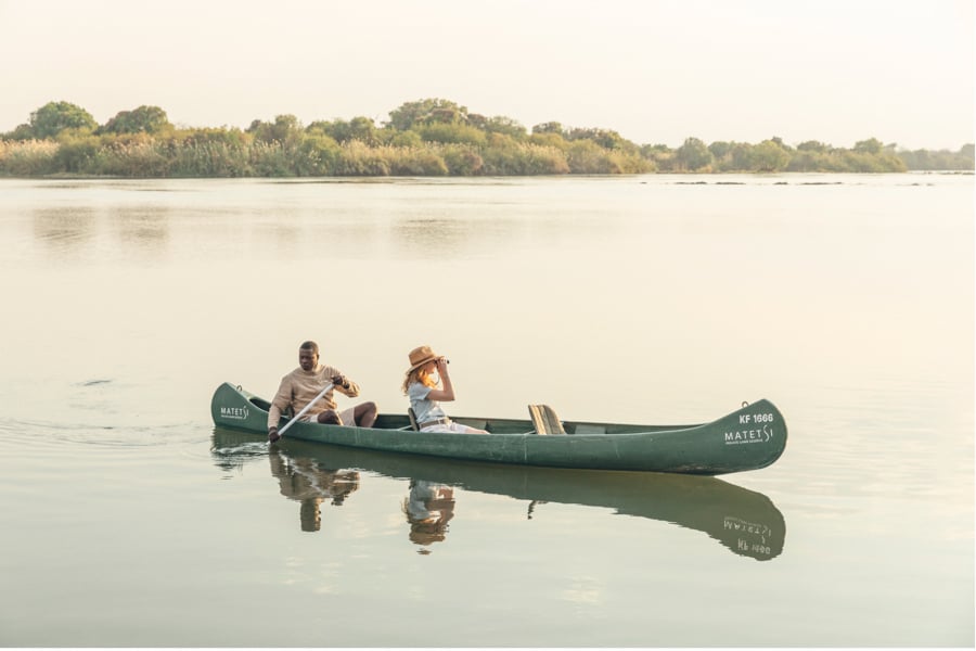 Image of two canoers on lake by London, United Kingdom-based photographer Tom Parker.