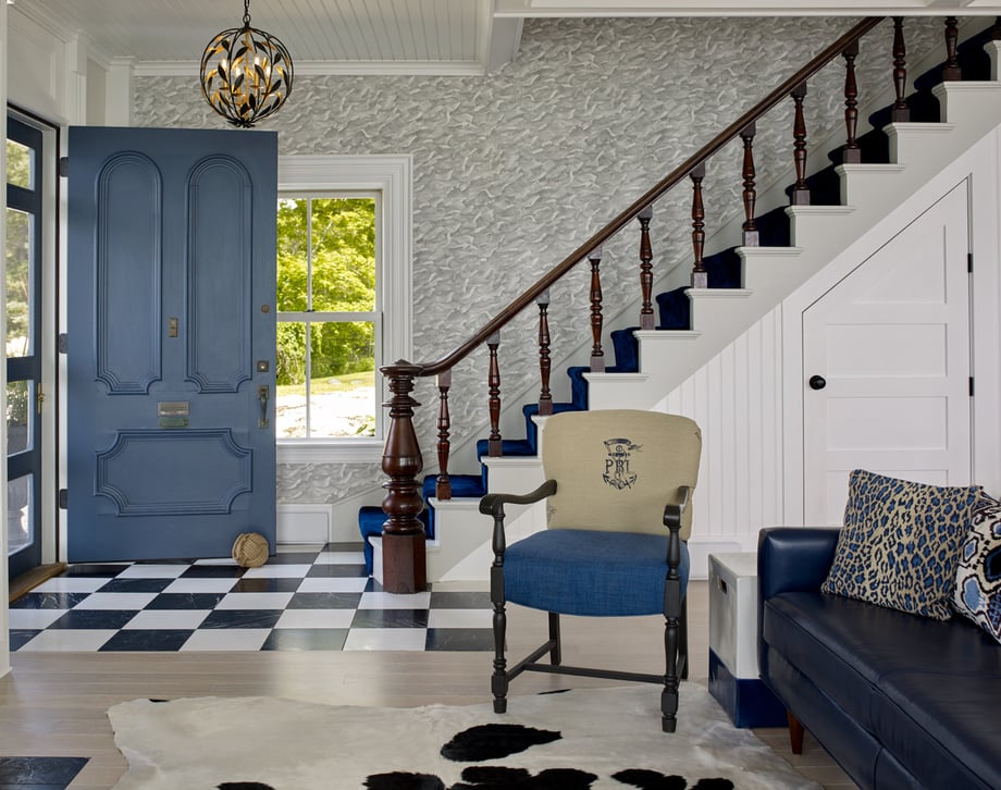 Darren Setlow's favorite Maine Home and Design photo shows a front entryway and stairwell in black, white, and blue