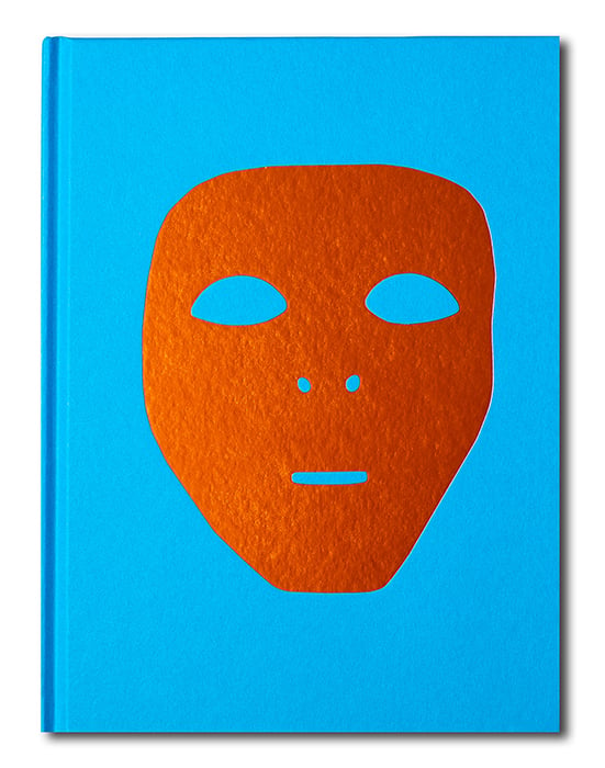 An image of the cover of Jonathan Blaustein's book. The copper-colored mask stands out against a sky-blue background.