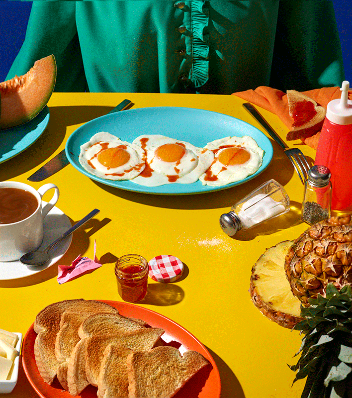 Gif of eggs being eaten by hand taken by photographers Adam and Robin Voorhes of Austin, Texas.