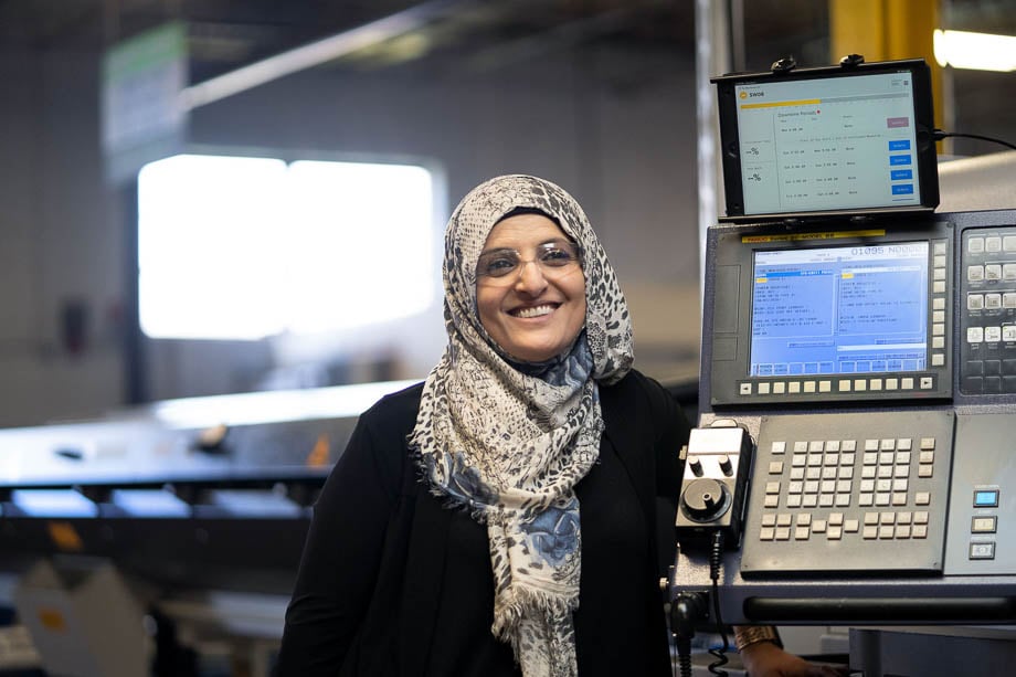 Photo of a Muslim worker at the office taken by Chicago-based corporate photographer Alex Garcia. 