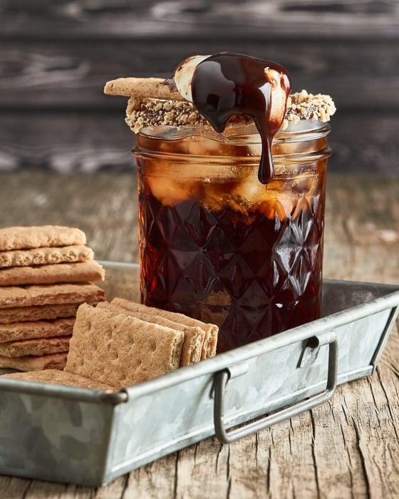 Photo of biscuits and a sweet drink with melted chocolate on top taken by New York City-based beverage photographer Amy Roth. 