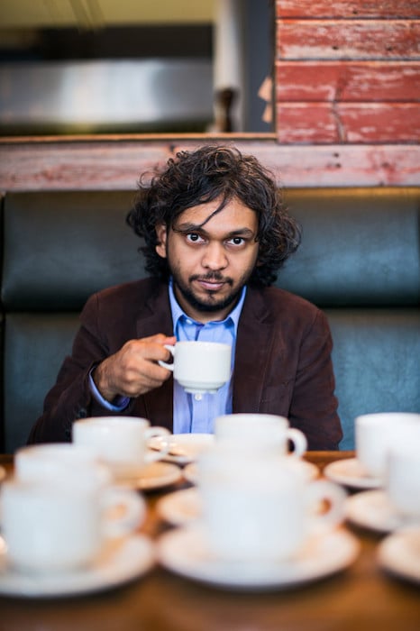 A quick snap of Anand Gandhi as he takes a short coffee break during the Toronto International Film Festival
