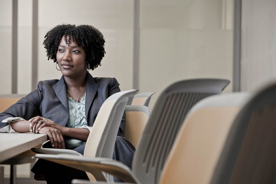 Photo of an African American businesswoman in an office taken by Chicago-based corporate photographer Andy Goodwin. 