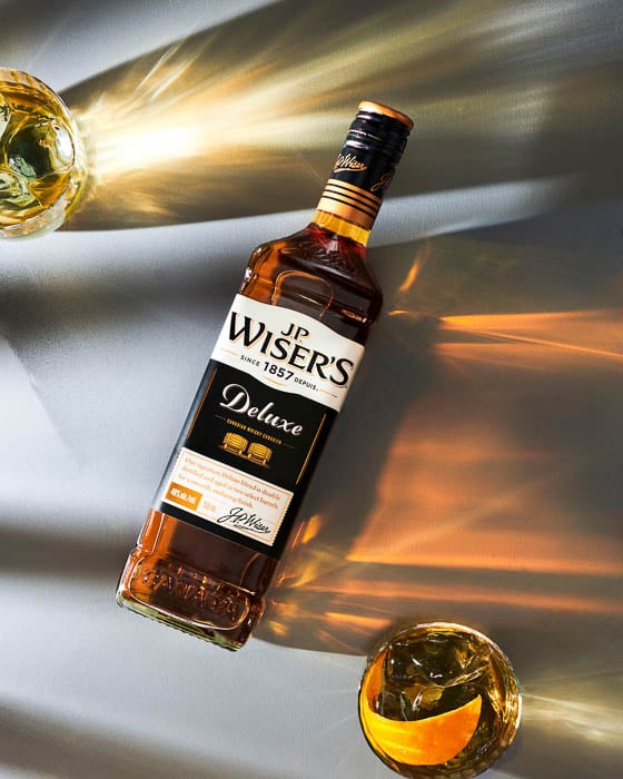 A photo of a J.P. Wiser's Canadian Whiskey bottle taken by Toronto-based product photographer Anukriti Goswami. 