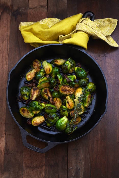 Photo of pan-fried brussels sprouts in a pan taken by Los Angeles-based food photographer Asami Zenri. 