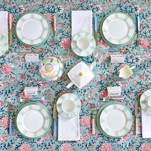 Aerial of table setting and flatware on colorful linens, by London product photographer Astrid Templier.