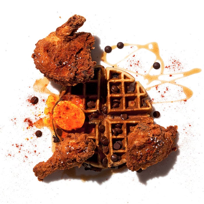 Photo of chicken and waffles with chocolate chips and spices taken by Boston-based food photographer Dave Bradley. 