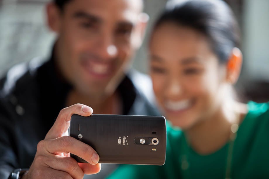 Photo of a couple taking a selfie on an LG Verizon 4G LTE smartphone taken by Miami-based product photographer Francisco Aguila. 