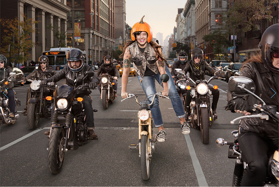 Biker gang with women and pumpkin on her head