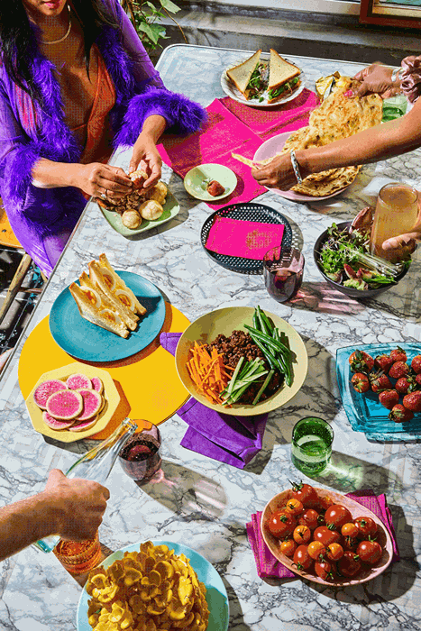 GIF of people having a meal during Spring or Summer taken by New York-based food photographer Lauren Volo. 