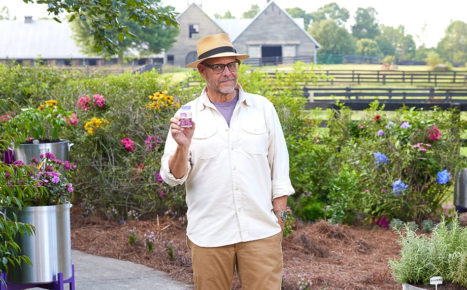 Outdoor photo of Alton Brown in a garden for Neuriva taken by Lindsey Dowell. 